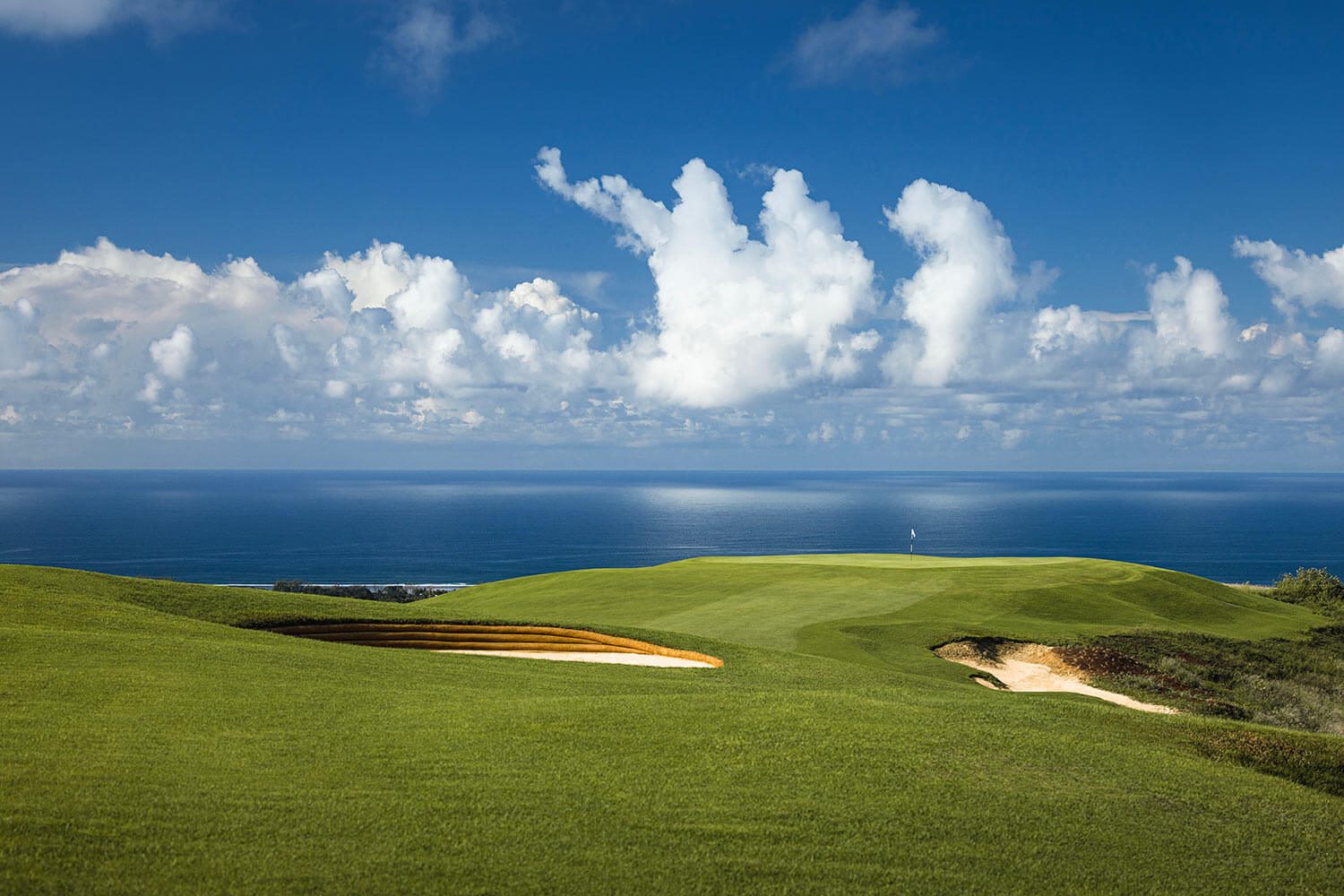 An ocean-view green at La Réserve Golf Links, Bel Ombre